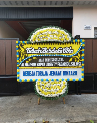 Papan Bunga Duka di Tegal S Mandala I